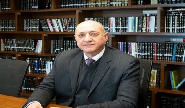 محمد غنام الشريك التنفيذي بمكتب بيكرمكنزي