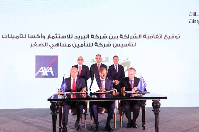 جانب من توقيع إتفاقية الشراكة بين أكسا والبريد